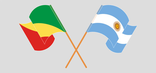 Crossed and waving flags of Republic of the Congo and Argentina