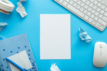 White blank mockup for copy space with frame made from office and school white blue stationery on...