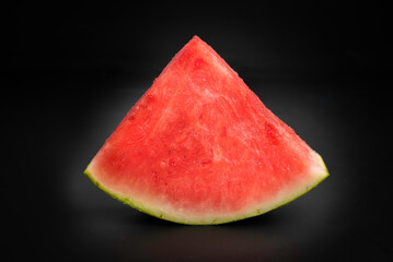 slices of watermelon isolated on black background