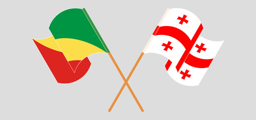 Fototapeta na wymiar Crossed and waving flags of Republic of the Congo and Georgia