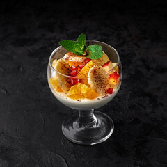 Pannacotta Classic Italian dessert with cream and gelatin with fruits, nuts. Healthy breakfast
