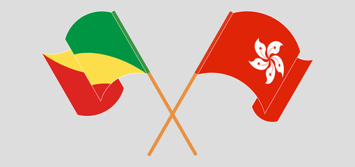 Crossed and waving flags of Republic of the Congo and Hong Kong