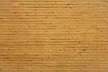 old beige brick wall. rough surface texture