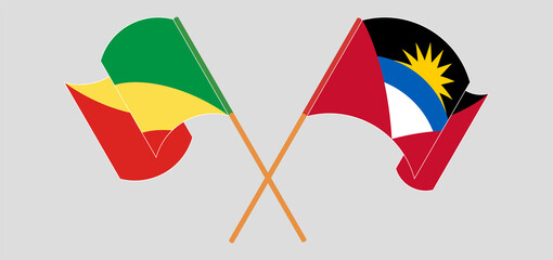Crossed and waving flags of Republic of the Congo and Antigua and Barbuda