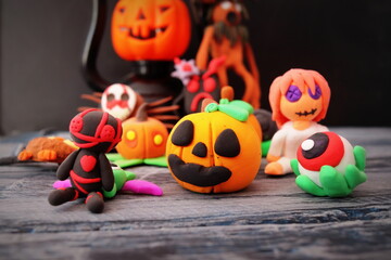 plasticine figurines halloween theme close up selective focus, kids crafts.