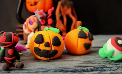 plasticine figurines halloween theme close up selective focus, kids crafts.