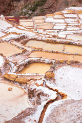 View of the natural salt pools in Las Salineras de Maras in the Sacred Valley of Cusco