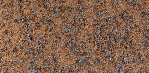 Deep muted color rust on a steel iron metal surface