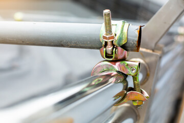 Selective focus to scaffolding pipe clamp and parts, An important part of building strength to...