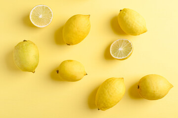 Fresh lemon on yellow color background, Flat lay, Top view