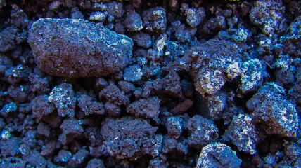 The background of the earth is a blue shade in close-up