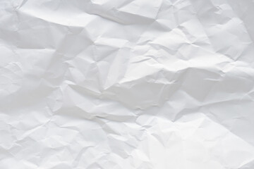 White crumpled paper texture background.
