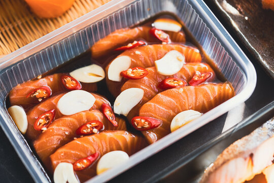 Fresh Raw Salmon Slide Marinated In A Mild Soy-sauce Based Brine On Delivery Go Box.Asian People Eating Sashimi Set Japan Restaurant.salmon Sashimi.Asian Food Menu.seafood Sashimi.korean Japan Food.