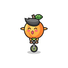 The cute apricot character is riding a circus bike