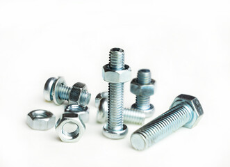 Metal nut and bolt on white background.