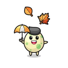 cartoon of the cute spotted egg holding an umbrella in autumn