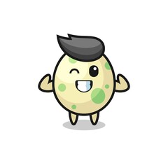 the muscular spotted egg character is posing showing his muscles