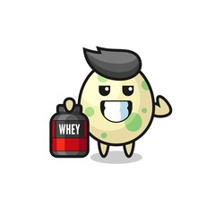 the muscular spotted egg character is holding a protein supplement
