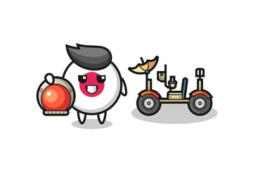 Fototapeta premium the cute japan flag badge as astronaut with a lunar rover