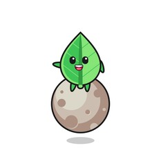 illustration of leaf cartoon sitting on the moon