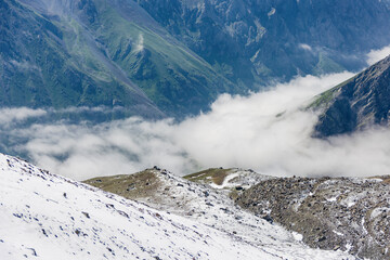 Mountain landscape view in Kyrgyzstan. Rocks, snow and stones in mountain valley view. Mountain...