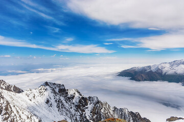 Mountain landscape view in Kyrgyzstan. Rocks, snow and stones in mountain valley view. Mountain panorama.