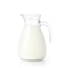 Glass jug of fresh milk isolated on white background. Clipping path.