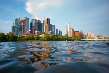 Naklejka premium Amazing Dramatic Austin Texas Sunset Mirror Town Lake Reflection with Colorful Cloud Reflecting on the Colorado River.