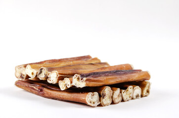 Natural chewy treats for dogs on a white background. Carefully s
