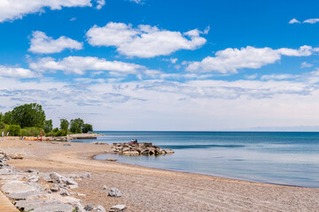 Beach at midday in June with few users and big sky.  Shot in the Toronto Beaches © Michael Connor Photo