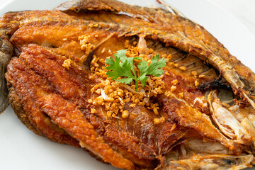 Fried Sea Bass Fish with Garlic