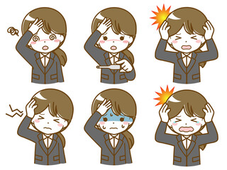 頭が痛いスーツの若い女性