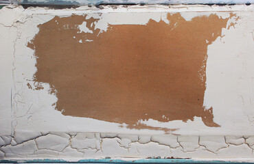 Abstract background, place for text. Board with a white frame, cracks. 