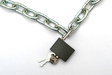 open padlock with keys hanging on a chain on a white background