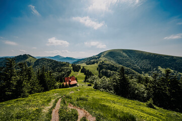 Naklejka na ściany i meble Ploska hill with mountain hut from Borisov, Big Fatra mountains, Slovakia. Hiking summer Slovakia landscape.