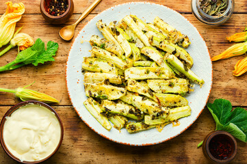 Roasted zucchini sticks with greens