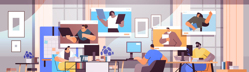 businesspeople discussing with colleagues in web browser windows during video call