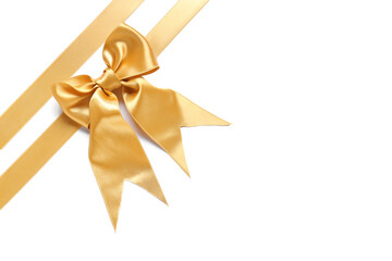 Beautiful golden ribbons with bow on white background