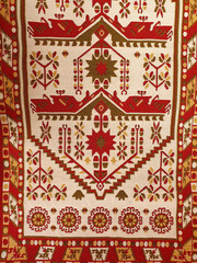 a rug with traditional Romanian motifs in Praid village - Romania
