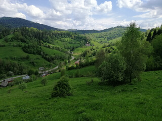Mountain village in spring season. Carpathian mountains in early Spring, Ukraine.