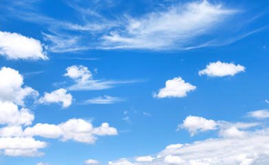 Naklejka na ściany i meble White clould patterns with breeze on vast bright blue sky background and space