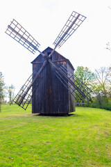 Old wooden windmill in Open-air Museum of Folk Architecture and Folkways of Middle Naddnipryanschina in Pereyaslav, Ukraine