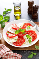 Caprese Salad with fresh tomatoes, basil and mozzarella cheese