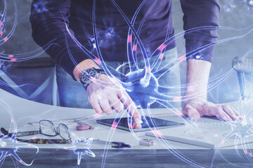 Double exposure of man's hands holding and using a phone and neuron drawing. Education concept.