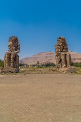 Vertical view of the Colossi of Memnon statues at the entrance of Luxor, Egypt