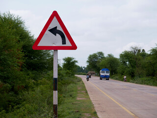 Road side arrow direction triangular shape board