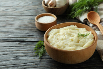 Concept of tasty eating with mashed potatoes on wooden table