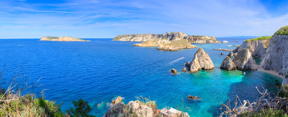 Seascape of Tremiti archipelago with Pagliai cliffs in San Domino island, Cretaccio ,San Nicola Capraia  islands in background. - obrazy, fototapety, plakaty
