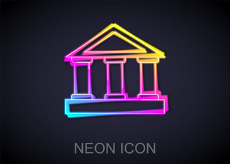 Glowing neon line Bank building icon isolated on black background. Vector