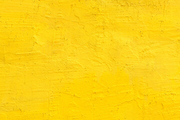Yellow cement wall as background